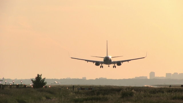 Silhouette of landing plane