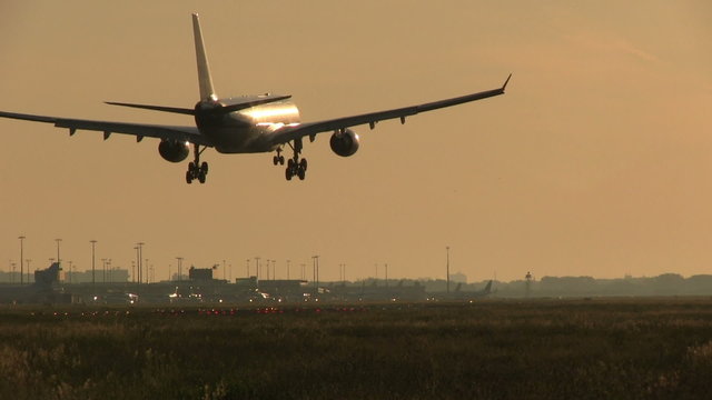 Airliner landing at dusk