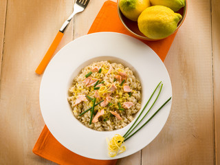 risotto with fresh salmon chive and lemon peel, healthy food