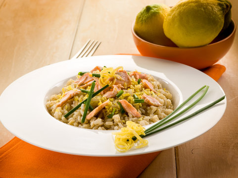 risotto with fresh salmon chive and lemon peel, healthy food