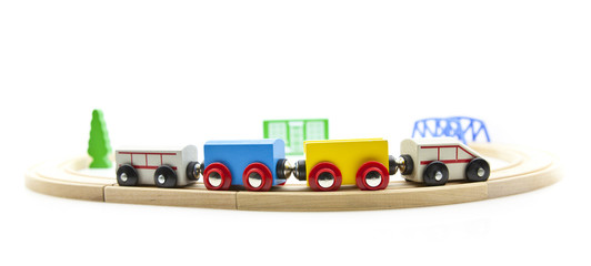 Wooden toy train isolated on a white background