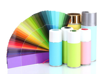 aerosol cans and bright paper palette isolated on white