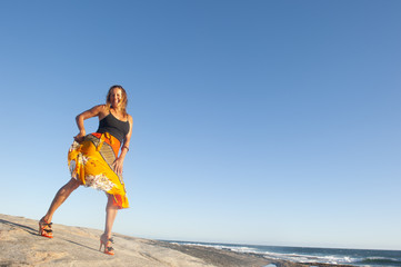 Sexy high heel lady happy at ocean holiday