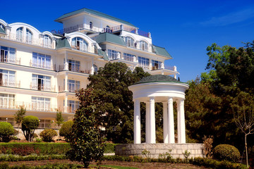 White classical gazebo and summer hotel resort