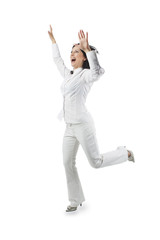 full length portrait of a woman rejoicing and making a jump