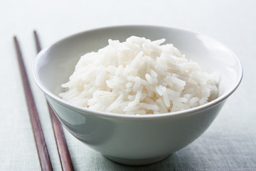 Long grain rice bowl with chopsticks