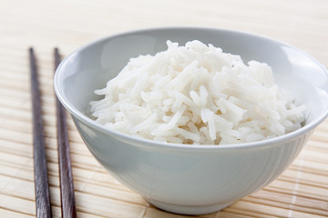 Long grain rice bowl with chopsticks