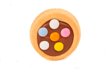 Biscuits with milk chocolate and coloured chocolate beans isolat