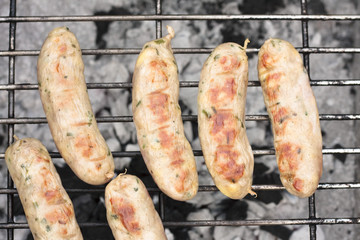 Sausages on barbecue
