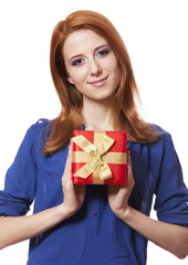 Beautiful red-haired girl with present box.