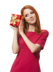Beautiful red-haired girl with present box.
