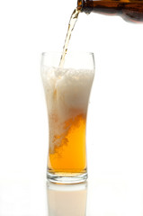 Beer pouring into the glass