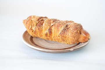 Hot dogs wrapped in crescent rolls with cheese and chicken in pl