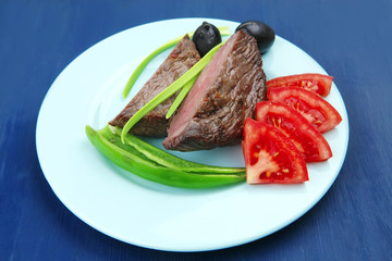 meat savory : grilled beef fillet mignon on blue plate