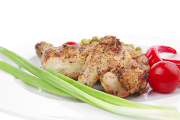chicken legs  grilled and garnished