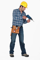 Man holding drill