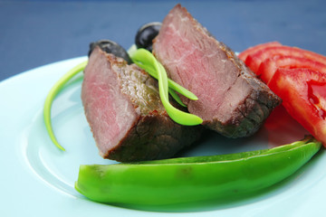 meat food : roast beef fillet mignon served on blue