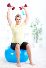 Senior woman doing yoga.