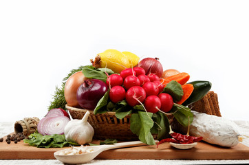 Healthy food. Fresh vegetables and fruits on a wooden board.
