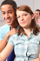 Couple sat in university lecture