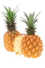 whole and half pineapples