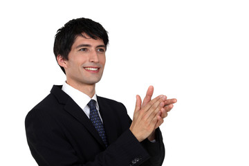 Businessman clapping