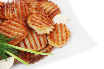 potato chips served with small pickled eggplants