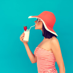 sensual girl with a summer cocktail