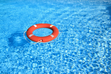 Life belt floating on water