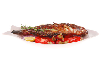 whole fried bass on plate