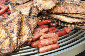 Outdoor cooking of different kinds of meat