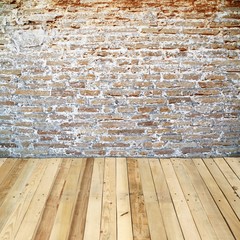 old brick wall room with wooden floor