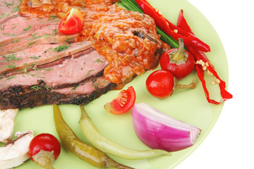 corned beef on plate with vegetables