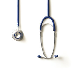 A medical stethoscope isolated on a white background - obrazy, fototapety, plakaty