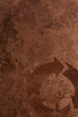 Old brown parer background with recycle sign