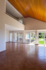 room with terracotta floor, interior