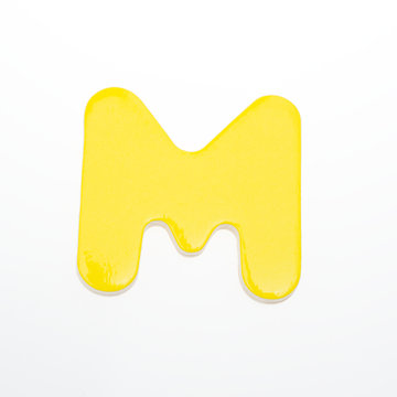 wooden toy letter M