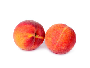 Peach fruits isolated on white background