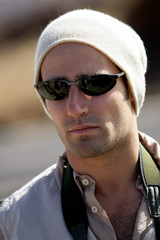 Man in sunglasses and beanie hat