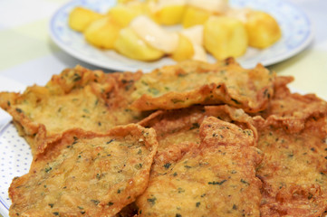spanish shrimp cakes and patatas bravas