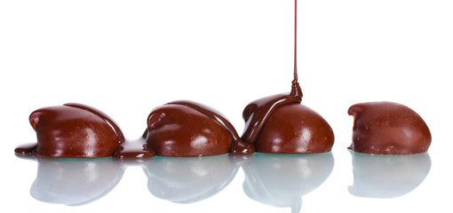 Сhocolate cookies poured chocolate  isolated on white
