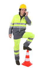 Construction worker with a walkie talkie