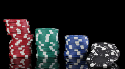 Casino chips isolated on black
