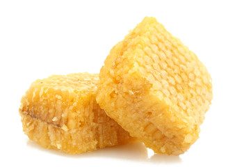 golden honeycombs isolated on white.