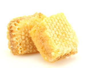 golden honeycombs isolated on white.