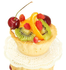 sweet cake with fruits isolated on white