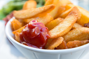 Golden French fries potatoes