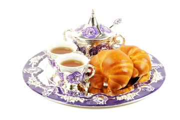 Metal set for tea and croissant