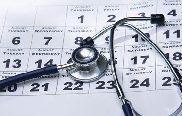 Stethoscope Over calendar