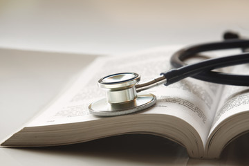 stethoscope on a pile of books